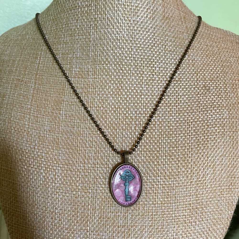 Whimsical pink and blue key pendant necklace